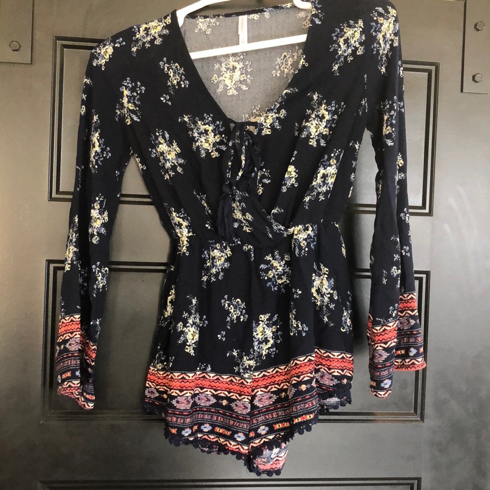 Navy Blue romper with floral and Aztec accents